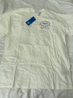 adidas short sleeve top  size large   details: -NWT -graphic tee  -Adidas New Yo